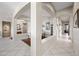 Arched hallway with tile flooring and views of the adjacent rooms at 5323 E Thunder Hawk E Rd, Cave Creek, AZ 85331