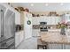 Bright kitchen with stainless steel appliances, island with breakfast bar and plenty of counter space at 5323 E Thunder Hawk E Rd, Cave Creek, AZ 85331