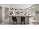 Spacious open-concept kitchen with granite countertops, a large island, and modern appliances at 5323 E Thunder Hawk E Rd, Cave Creek, AZ 85331