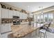 Bright kitchen with granite countertops, stainless steel appliances, and tiled backsplash at 5323 E Thunder Hawk E Rd, Cave Creek, AZ 85331