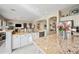 Open-concept kitchen featuring granite countertops, a breakfast bar, and stainless steel appliances at 5323 E Thunder Hawk E Rd, Cave Creek, AZ 85331