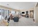 Large living room with lots of natural light boasts a neutral color palette and an airy feel at 5323 E Thunder Hawk E Rd, Cave Creek, AZ 85331