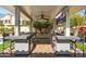 State-of-the-art outdoor kitchen with a bar, built-in grill, and multiple TVs for entertaining at 5456 E Woodridge Dr, Scottsdale, AZ 85254
