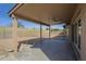 Spacious covered patio featuring a ceiling fan, offering a relaxing outdoor space at 6010 E Greenway Ln, Scottsdale, AZ 85254