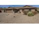 Inviting single-story home featuring a two car garage and desert landscaping at 6010 E Greenway Ln, Scottsdale, AZ 85254