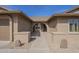 Inviting arched entryway leading to the front door of this well-maintained home at 6010 E Greenway Ln, Scottsdale, AZ 85254
