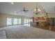 Open floor plan with living room, dining area, and kitchen, featuring recessed lighting and backyard access at 6010 E Greenway Ln, Scottsdale, AZ 85254