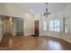 Bright entryway with hardwood floors and large windows, providing natural light at 6010 E Greenway Ln, Scottsdale, AZ 85254