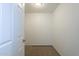 Spacious walk in closet with a carpeted floor, overhead lighting, and fresh paint at 6010 E Greenway Ln, Scottsdale, AZ 85254