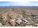 Spectacular aerial shot of a home amid the desert landscape, showcasing the spacious layout and neighborhood at 6404 S Lazy Ln, Gold Canyon, AZ 85118