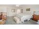 Bedroom with a ceiling fan, and neutral paint with tile flooring at 6404 S Lazy Ln, Gold Canyon, AZ 85118