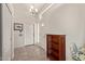 Bright entryway featuring tile floors, a coat closet, and lots of natural light at 6404 S Lazy Ln, Gold Canyon, AZ 85118
