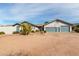 Charming single-story home featuring a three-car garage, desert landscaping and beautiful desert views at 6404 S Lazy Ln, Gold Canyon, AZ 85118