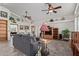 Living room featuring tile floors, ceiling fans, and ample storage space at 6404 S Lazy Ln, Gold Canyon, AZ 85118