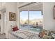 Cozy window seat offering views of the desert landscape and mountains at 6404 S Lazy Ln, Gold Canyon, AZ 85118