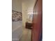 Charming bathroom featuring a furniture-style vanity with vessel sink, warm lighting, and decor at 6411 S River Dr # 53, Tempe, AZ 85283
