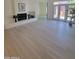 Spacious living room with fireplace and seamless access to the patio at 6411 S River Dr # 53, Tempe, AZ 85283