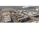 Scenic aerial view showcasing a townhome community near State Farm Stadium, surrounded by landscaping at 6605 N 93Rd Ave # 1022, Glendale, AZ 85305