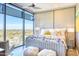 Bright bedroom with large windows offering panoramic views and a comfortable seating area at 7120 E Kierland Blvd # 1117, Scottsdale, AZ 85254