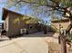 Private backyard featuring a patio area, block accents, and desert landscaping at 757 W Magma Rd, San Tan Valley, AZ 85143