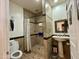 Accessible bathroom with a walk-in shower and pedestal sink at 757 W Magma Rd, San Tan Valley, AZ 85143