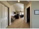 Open living space with a piano, fireplace, and comfortable seating area at 757 W Magma Rd, San Tan Valley, AZ 85143