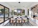 Elegant dining room with contemporary lighting, large windows, and stylish decor at 86Xx E Stagecoach Pass # 4, Carefree, AZ 85377