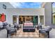 Inviting outdoor patio featuring comfortable seating around a modern fire pit and seamless indoor-outdoor transition at 86Xx E Stagecoach Pass # 4, Carefree, AZ 85377