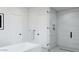 Clean, modern bathroom featuring a soaking tub, glass-enclosed shower, and sleek, minimalist design at 86Xx E Stagecoach Pass # 5, Carefree, AZ 85377
