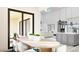 Open-concept dining area with large windows offering ample natural light and modern fixtures at 86Xx E Stagecoach Pass # 5, Carefree, AZ 85377