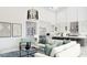 Bright, open-concept living space featuring modern furnishings, a sleek kitchen, and high, vaulted ceilings at 86Xx E Stagecoach Pass # 5, Carefree, AZ 85377