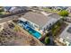 Beautiful backyard with a sparkling pool, covered patio, and lush landscaping, perfect for outdoor entertaining and relaxation at 9183 W Foothill Dr, Peoria, AZ 85383