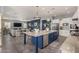Open kitchen with a large island, stainless steel appliances, and seamless flow to the living space at 9183 W Foothill Dr, Peoria, AZ 85383