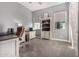 Home office with a comfortable brown office chair, large desk, and neutral decor at 9183 W Foothill Dr, Peoria, AZ 85383