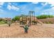 Community playground featuring modern play equipment, designed to provide children with a safe and fun recreational space at 9183 W Foothill Dr, Peoria, AZ 85383