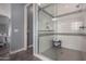 Modern glass shower with white tiled walls and stylish fixtures at 9183 W Foothill Dr, Peoria, AZ 85383