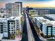 Aerial view of city street and the architectural design of nearby buildings at 1 E Lexington Ave # 1211, Phoenix, AZ 85012