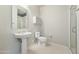 Small bathroom featuring a pedestal sink and glass-enclosed shower at 1 E Lexington Ave # 1211, Phoenix, AZ 85012