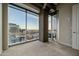 This light-filled room with city views features floor-to-ceiling windows, and neutral carpeting at 1 E Lexington Ave # 1211, Phoenix, AZ 85012