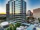 Modern high-rise building with sleek glass facade, and city views at 1 E Lexington Ave # 1211, Phoenix, AZ 85012