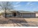 Charming single-story home features a well-kept yard and a three car garage at 11265 E Laguna Azul Cir, Mesa, AZ 85209