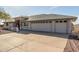 Spacious three car garage provides ample parking and storage space at 11265 E Laguna Azul Cir, Mesa, AZ 85209