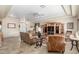 Bright and airy living room with comfortable seating and tile floors at 11265 E Laguna Azul Cir, Mesa, AZ 85209