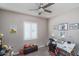 Bedroom with modern ceiling fan at 15233 W Baden St, Goodyear, AZ 85338