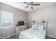 Bedroom with modern decor and a ceiling fan at 15233 W Baden St, Goodyear, AZ 85338