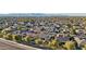 An aerial view of a desert community showing a variety of homes and mature trees at 15837 W Bonitos Dr, Goodyear, AZ 85395