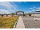 Expansive backyard featuring desert landscaping, clear blue skies, and a metal structure at 1612 N 201St Ave, Buckeye, AZ 85396