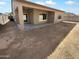 Expansive backyard with a covered patio, offering potential for outdoor living and entertaining at 16472 W Tether Trl, Surprise, AZ 85387