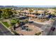 Aerial view of outdoor mall featuring restaurants, store fronts, and community park at 16629 E Westby Dr, Fountain Hills, AZ 85268