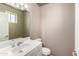 Bathroom featuring a white sink, mirror, toilet, and walls at 16629 E Westby Dr, Fountain Hills, AZ 85268